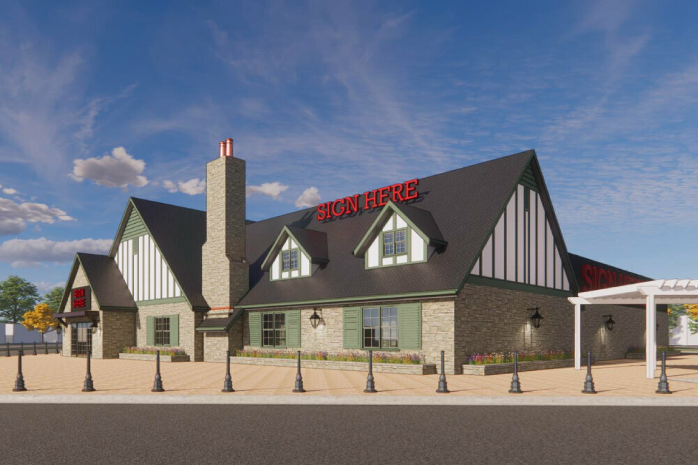 The most recent design shared by the development group shows what a boutique grocery chain might look like on the corner of Sunshine Street and National Avenue.
